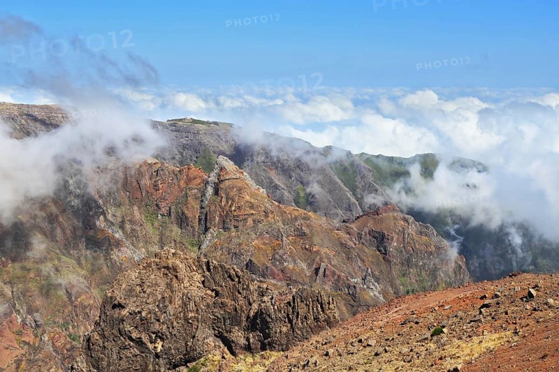 The highest peak of Madeira Island - Pico Ruyvu. By strong wind in the mountains of Madeira flying clouds