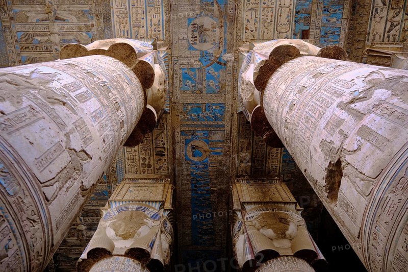 Colonnade at Hypostyle Hall of Temple of Hathor. Columns are decorated with reliefs and hieroglyphics. Dendera Temple complex, Qena, Egypt, Africa