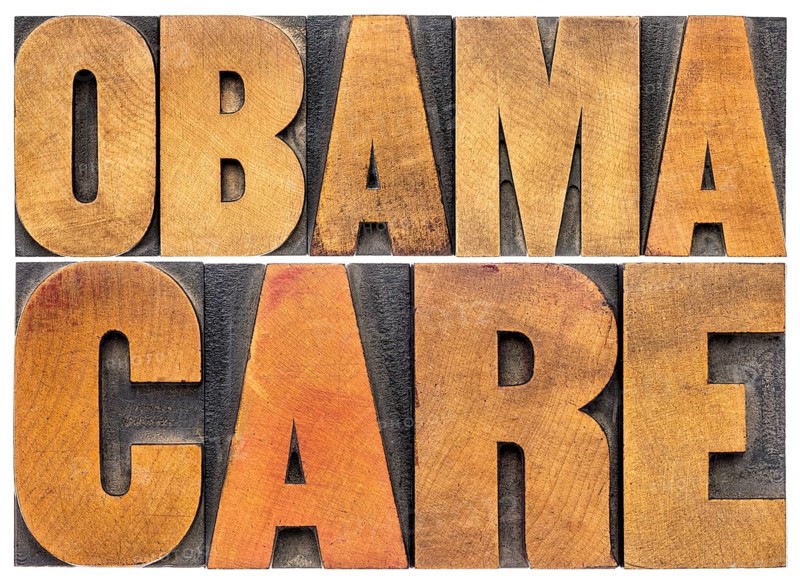Obamacare typography - isolated word abstract in letterpress wood type