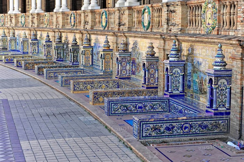 Plaza de España in Seville, Seville, Andalusia, Spain, Europe, Several artistic benches with colourful tiles along a wall, Europe