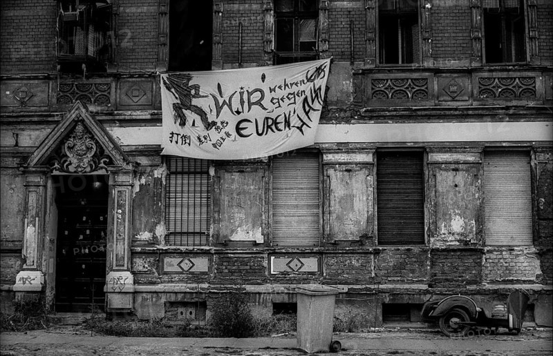 Germany, Berlin, 20 October 1991, Pfarrstraße, many houses in the street are occupied by autonomists (leftists), on the other side of the street there is an integration centre for neo-Nazis run by the church: We defend ourselves against your hatred, Europe
