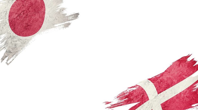 Flags of Japan and Denmark on White Background
