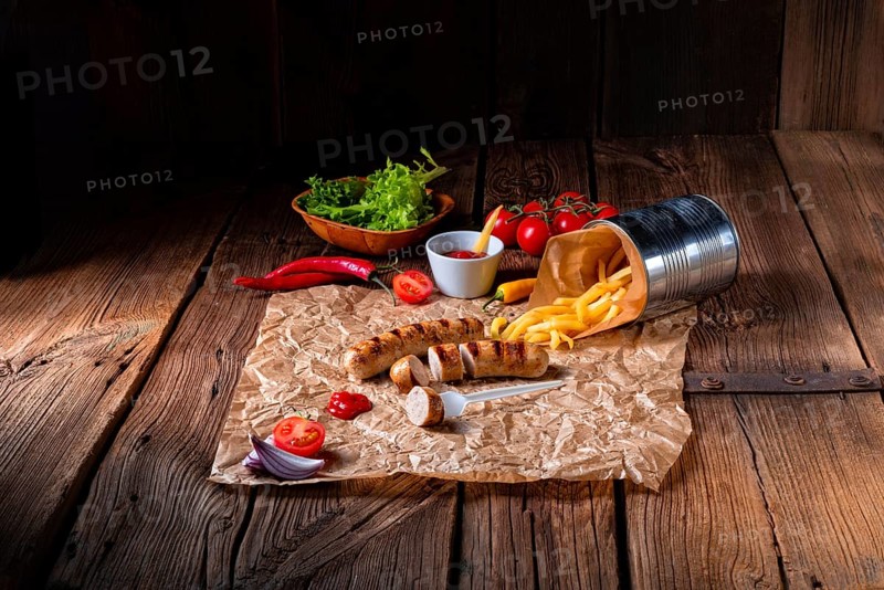 Rustic bratwurst with pommes and hot ketchup