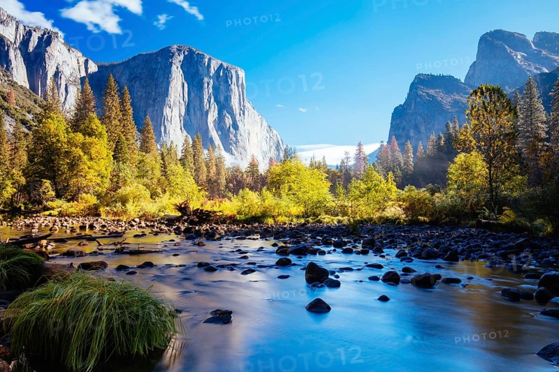 The view from within Yosemite Valley and Northside Drive of surrounding rock faces on a sunny autumn morning in California, USA, North America