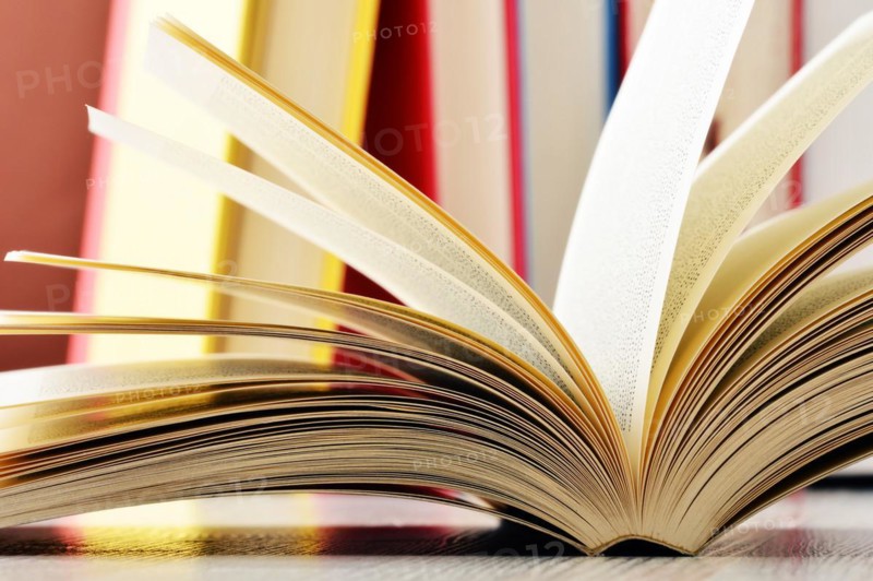 Composition with glasses and books on the table