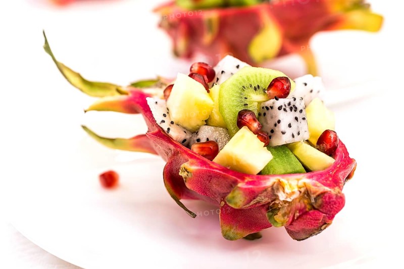 Half pitahaya filled with fruit salad
