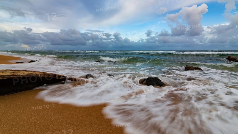 A dramatic sunset looking over the Pacific Ocean. Kauai, Hawaii