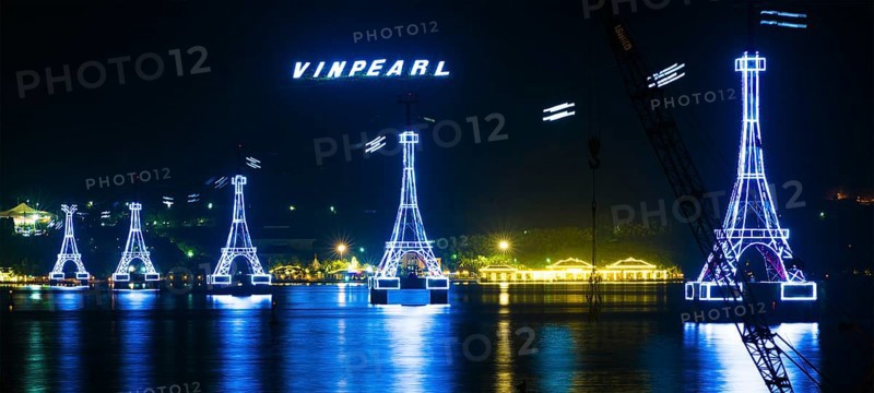 NHA TRANG, VIETNAM - JANUARY 4, 2016: A night view at illuminated supports of cableway to Vinpearl, a large amusement park located on an island, the main place of interest in the city which is a popular sea resort