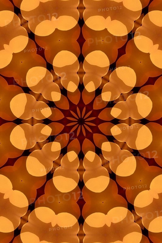 Abstract kaleidoscope pattern in warm colours Abstract kaleidoscope pattern in warm colours