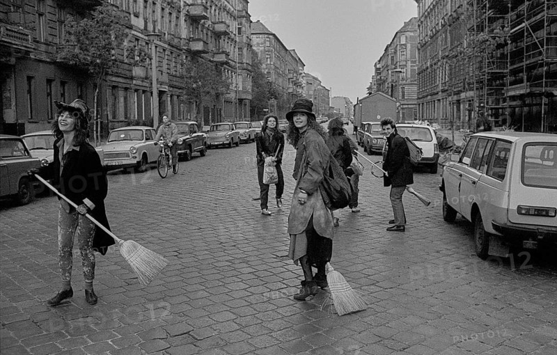 GDR, Berlin, 30.04.1990, Witches with brooms in Wörther Strasse, on the way to the water tower, where the witches' bonfire burns on Walpurgis Night 1990