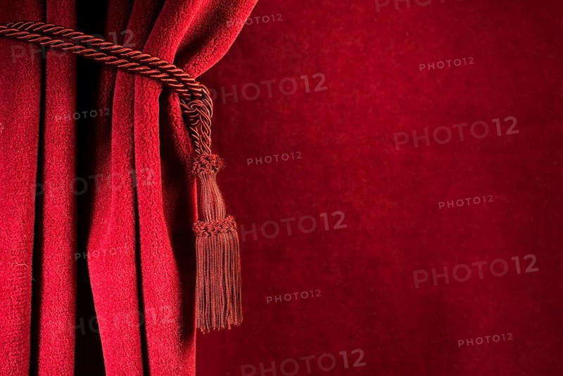Red theatre curtain and red tassels
