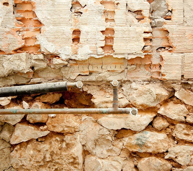 Plumbing installation in kitchen interior construction works