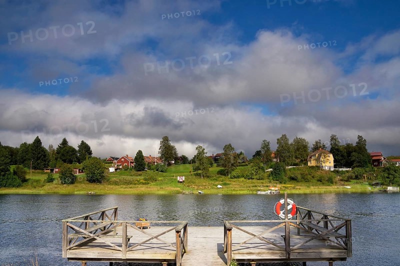 A wooden jetty with a nice view over the Osterdalalven river close to the Swedish village Djuras