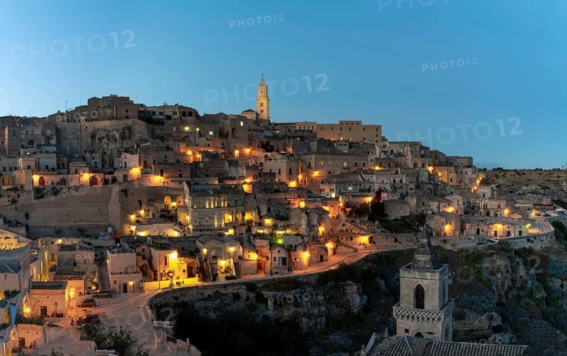 Matera, Italy, 26 November, 2023: view of the old town of Matera after sunset with the lights coming onMatera, Italy, 26 November, 2023:, Europe