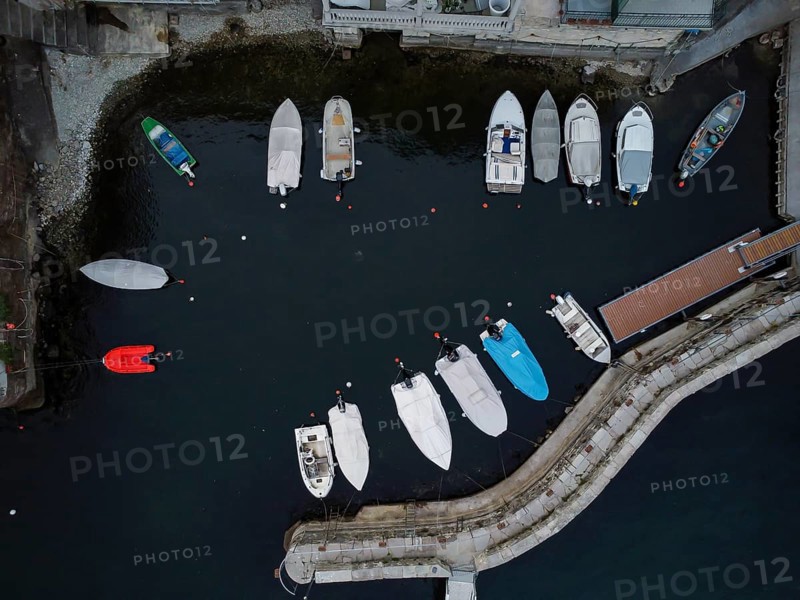 Aerial view of a dock with moored boats