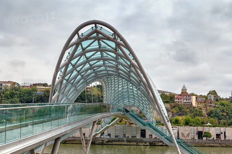 Bridge of Peace is a bow-shaped pedestrian bridge over the Kura River in downtown Tbilisi, Georgia, Asia