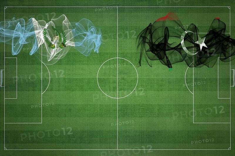 Guatemala vs Libya Soccer Match, national colors, national flags, soccer field, football game, Competition concept, Copy space