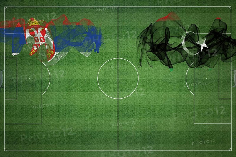 Serbia vs Libya Soccer Match, national colors, national flags, soccer field, football game, Competition concept, Copy space