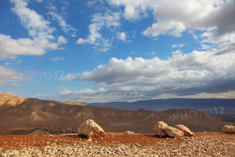 Gorgeous clear day in the Judean desert. Huge boulders along the roads, clear skies