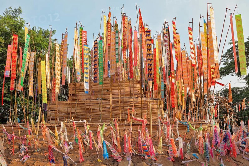 The flags and pennants adorn a special bamboo tower. Thai New Year - Songkran