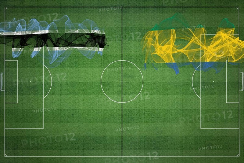 Botswana vs Gabon Soccer Match, national colors, national flags, soccer field, football game, Competition concept, Copy space