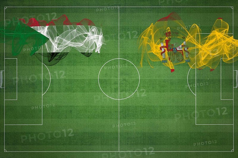 Sudan vs Spain Soccer Match, national colors, national flags, soccer field, football game, Competition concept, Copy space