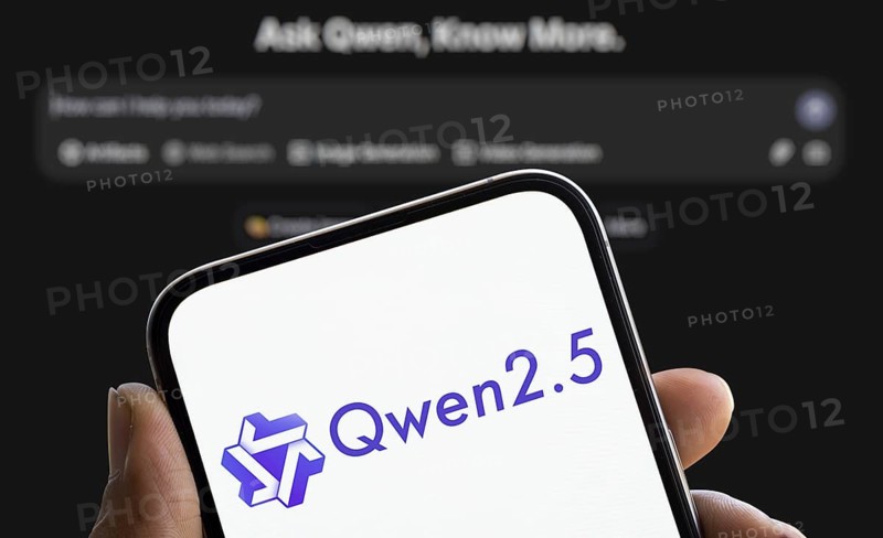 Alibaba Qwen 2.5 logo is displayed on smartphone