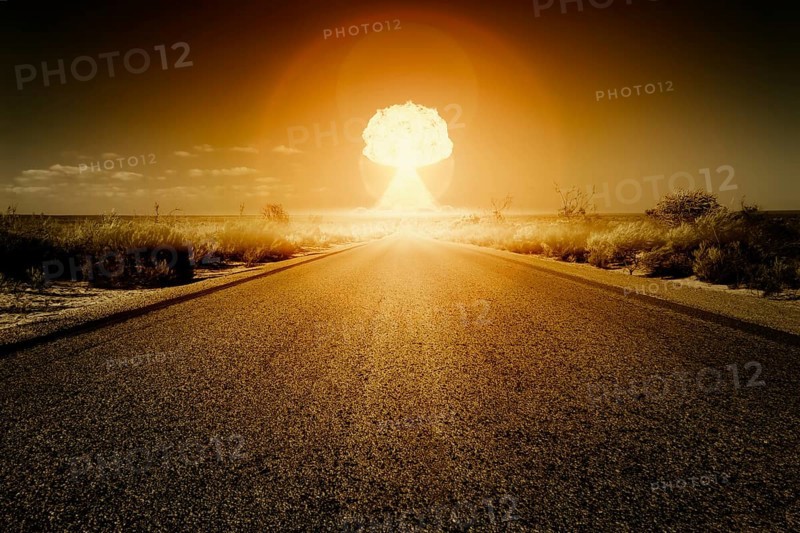 An image of a road to a nuclear bomb explosion