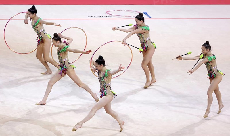 Sofia, Bulgaria - 27 March, 2021: Team Turkey perform during the 3 Hoops + 2 pairs of Clubs group qualifications at the 2021 Rhythmic Gymnastics Sofia World Cup, Sofia, Bulgaria, Europe