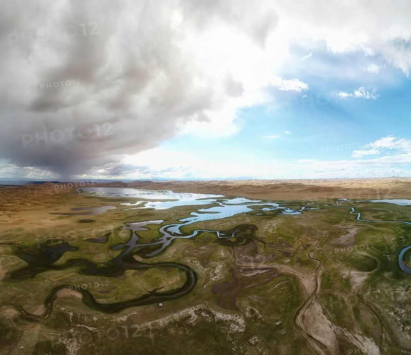 Aerial panorama sand desert Mongol Els and Zavkhan river