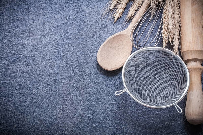 Ripe wheat rye ears spoon rolling-pin egg whisk sieve