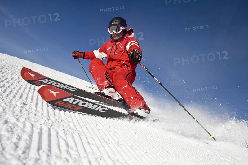 Skiers in action, deep snow, Austria, Europe