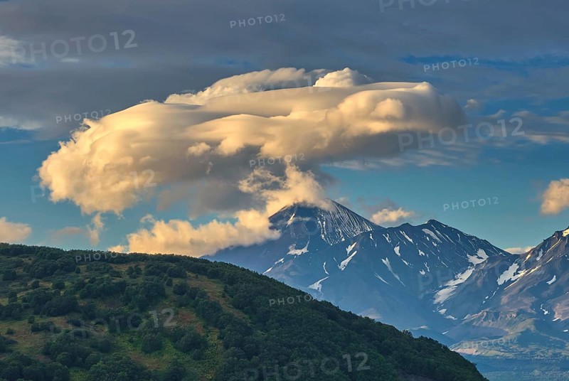 Dramatic spectacular lenticular cloud formation over volcano on Kamchatka peninsula, Russia, Europe