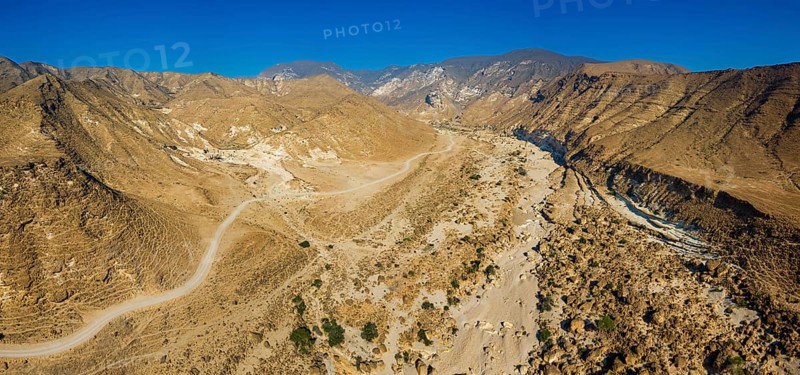 Landscape in Oman, mountains, Wadi Ashawq, road, dry riverbed Salalah, Al Mughsyal / Wadi Ashawq, Dhofar, Oman, Asia