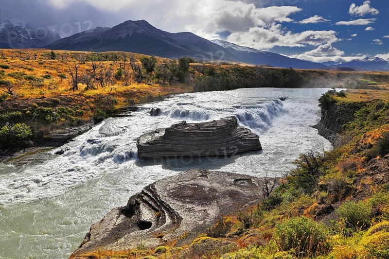 The majestic cascading waterfall - Cascades Paine. National Park Torres del Paine in southern Chile, Patagonia