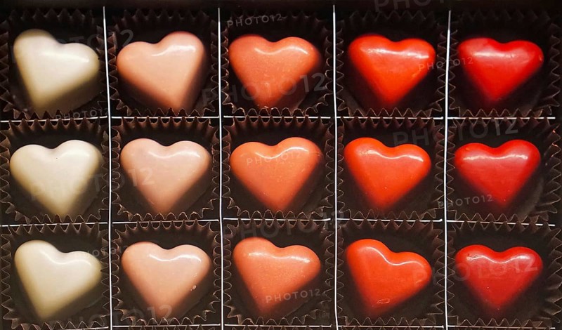 Heart shape chocolate pralines in the box