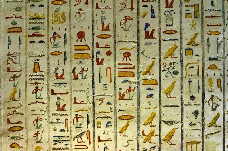 Ancient color egypt images and hieroglyphics on wall