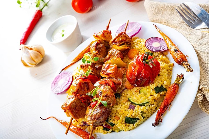 Kebabs with vegetables and bulgur