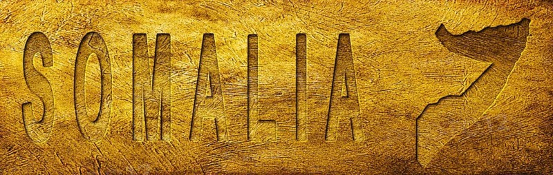 Somalia Map and Text on Grunge Gold Texture