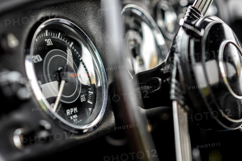 Details of a classic car in a museum