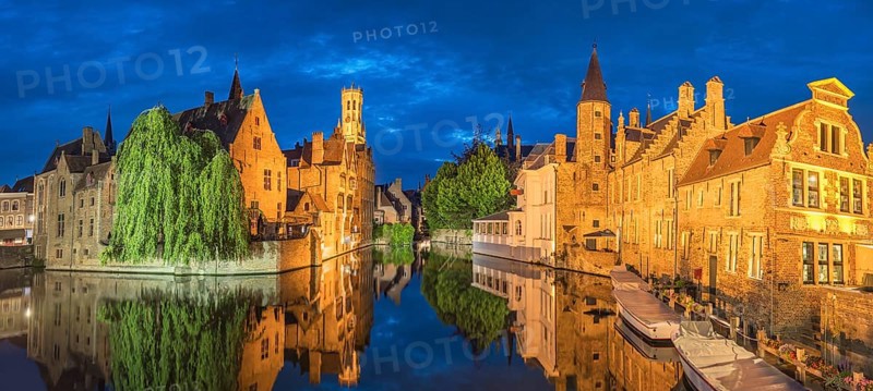 Bruges Belgium, night panorama city skyline at Rozenhoedkaai Dijver Canal with Belfry Tower