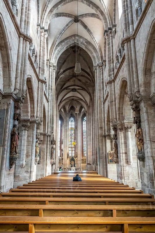 An image of a man alone in the church