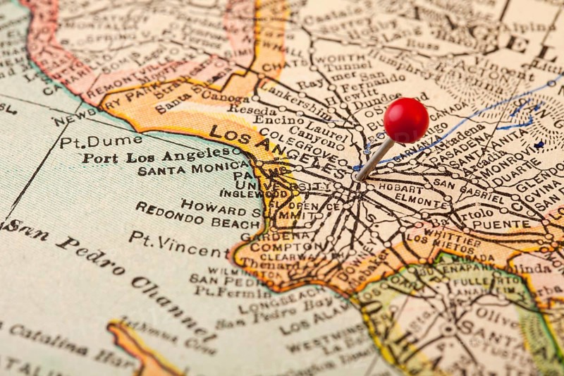 Los Angeles, California, vintage 1920s map (printed in 1926 - copyrights expired) with a red pushpin, selective focus
