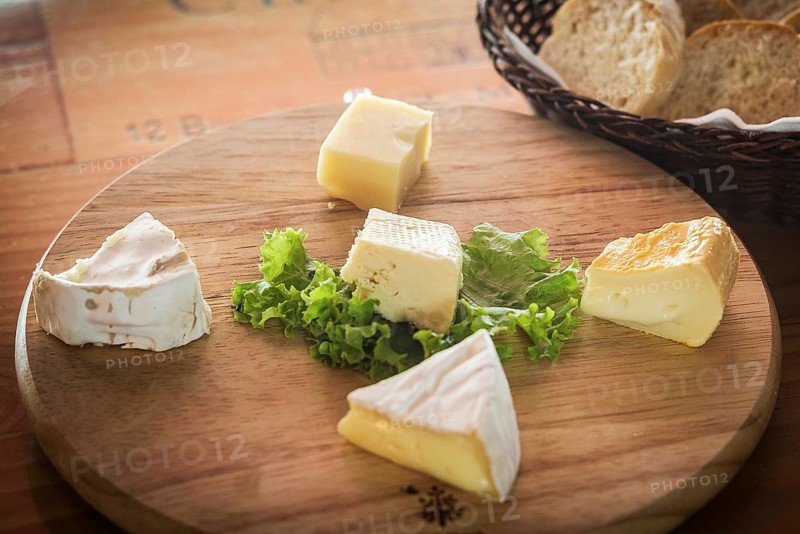 Mixed traditional french cheese platter with bread