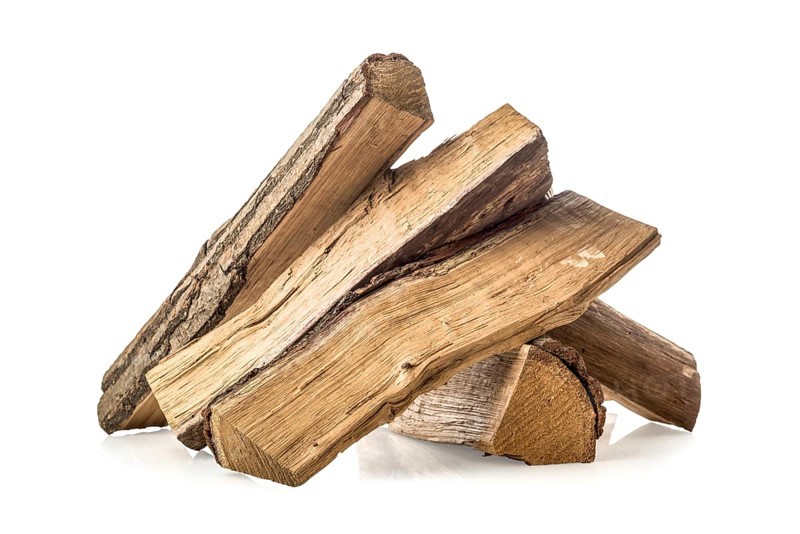Stacked pine firewoods isolated on a white background