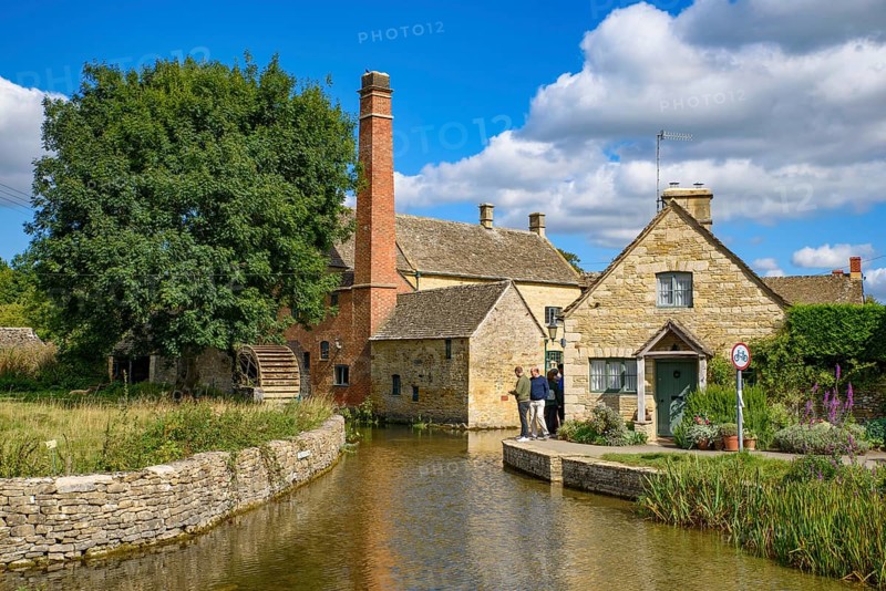 Old water mill in Lower Slaughter, a village in Cotswolds area, England, UK