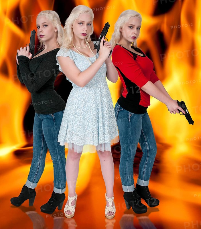 Beautiful woman with a loaded handgun pistol