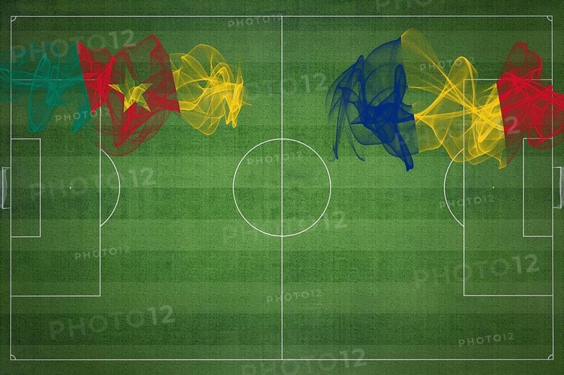 Cameroon vs Romania Soccer Match, national colors, national flags, soccer field, football game, Competition concept, Copy space
