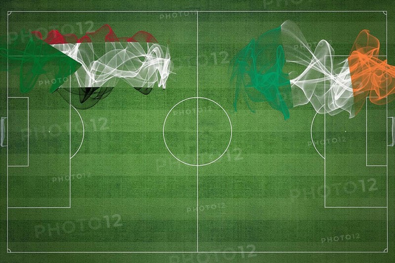 Sudan vs Ireland Soccer Match, national colors, national flags, soccer field, football game, Competition concept, Copy space