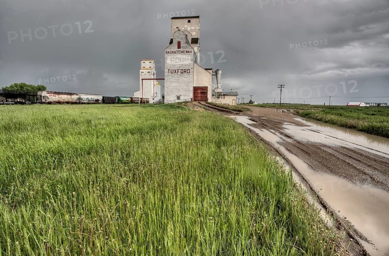 Prairie Grain Elevator in Saskatchewan Canada with storm clouds